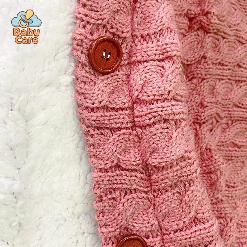 Nid d'ange bébé tricot à boutons - détail du produit