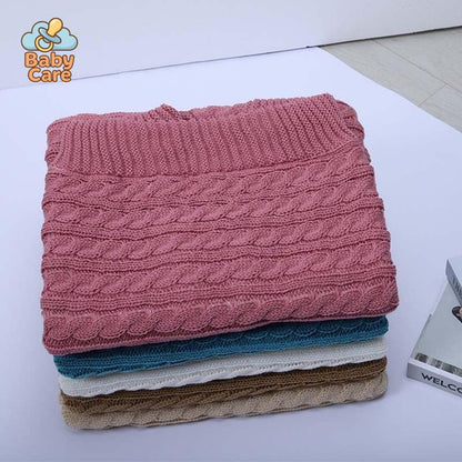 Nid d'ange bébé tricot à boutons - zoom sur la matière