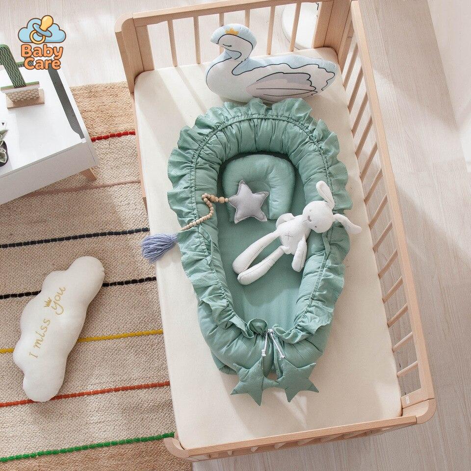 Réducteur de lit bébé – nid bébé en coton - photo lifestyle