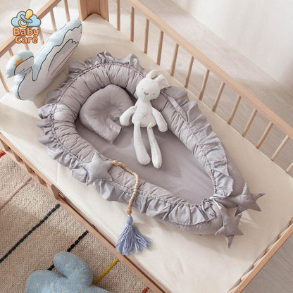 Réducteur de lit bébé – nid bébé en coton - utilisation en situation