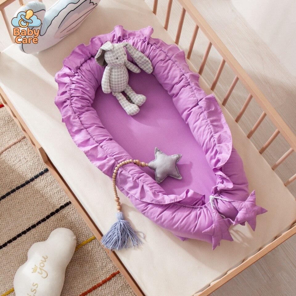 Réducteur de lit bébé – nid bébé en coton - packaging du produit