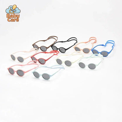 Lunettes de soleil bébé flexibles avec sangle UV400 - photo lifestyle