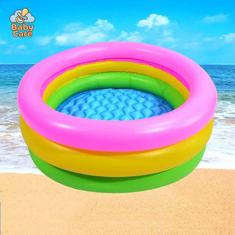 Piscine bébé gonflable arc-en-ciel à trois anneaux - vue de profil
